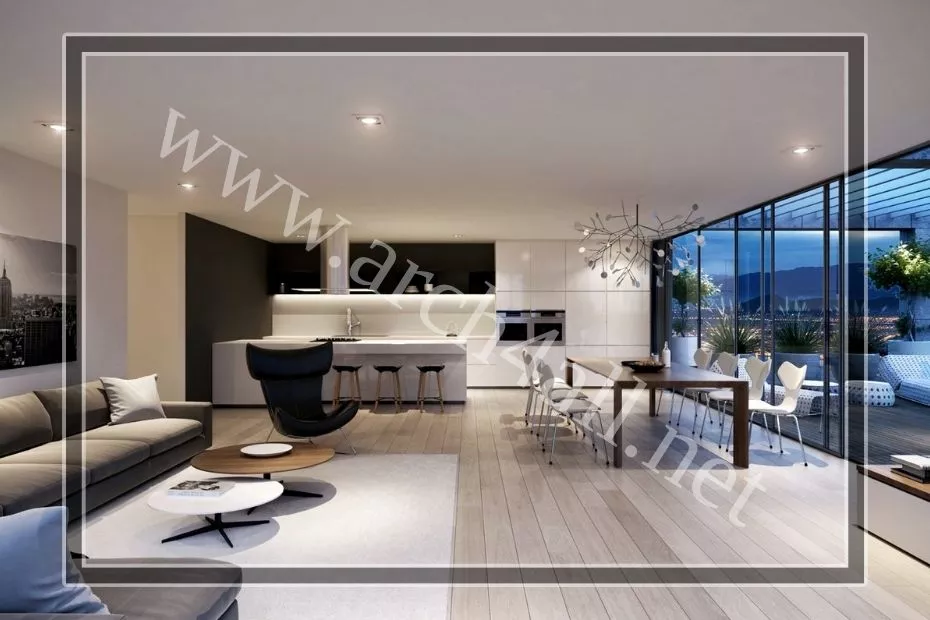 تصميم صالة استقبال بتناغم بين الأرضيات ذات اللون الرمادي وطلاء الجدران الأبيض